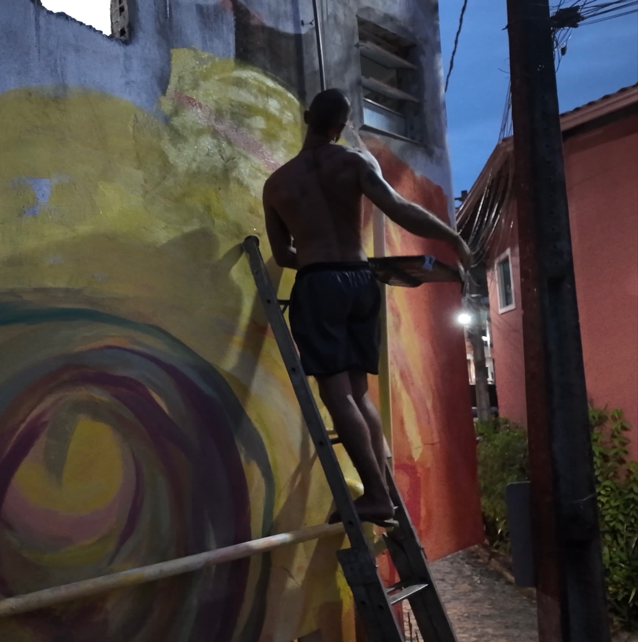Mural in progress — Brazil, at nightfall